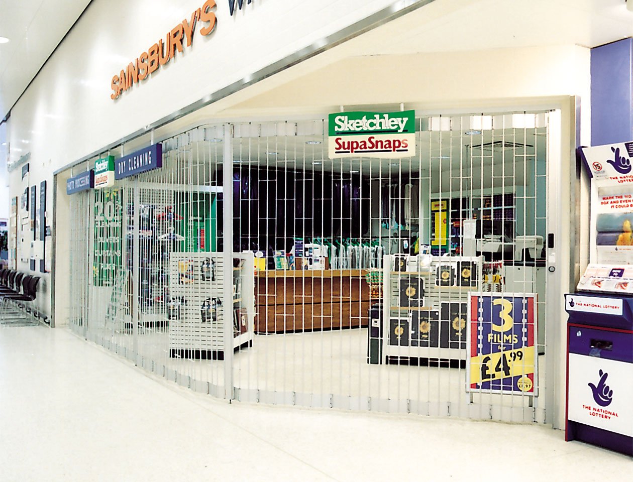 ali glyde sliding foliding grille used by sainsburys supermarket