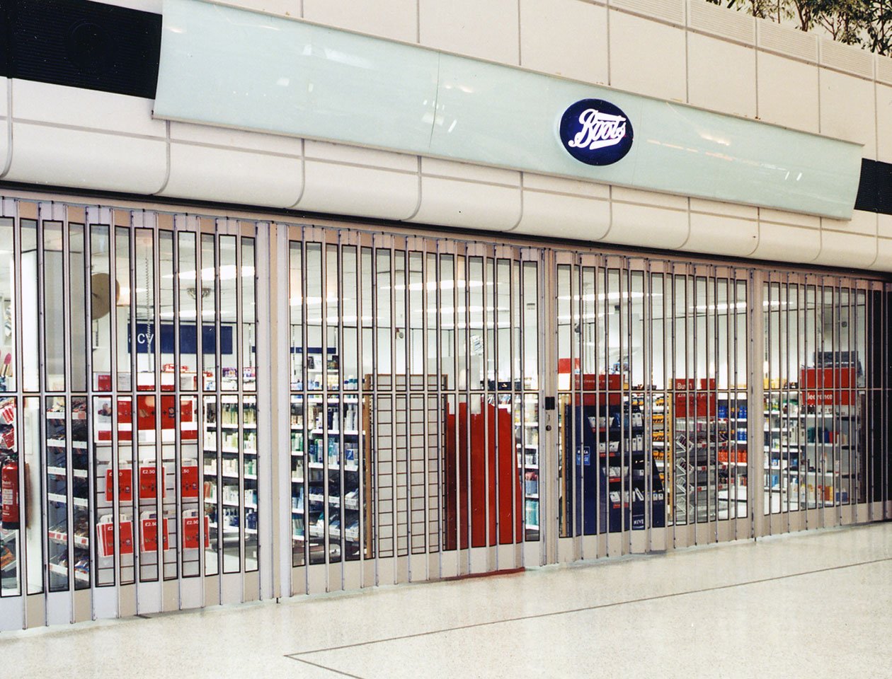 aluminium sliding shutters used by Boots pharmacy