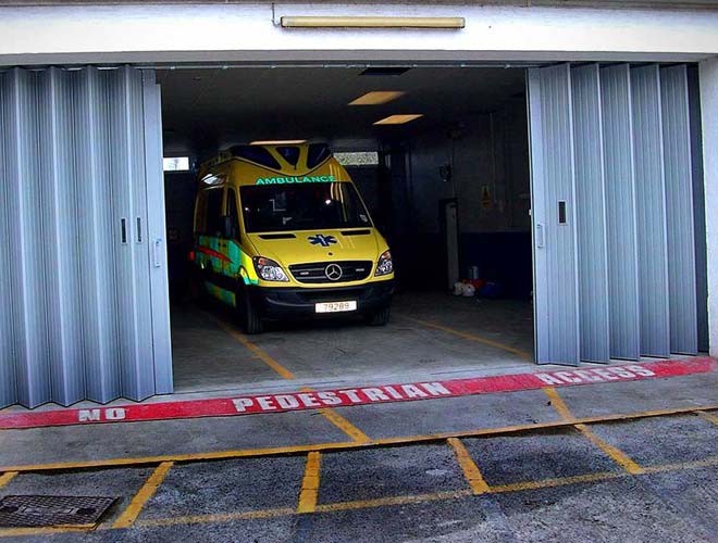 horizontally folding industrial door at an ambulance station