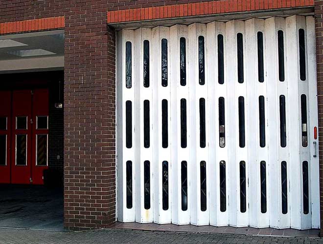 horizonally folding industrial door at a fire station