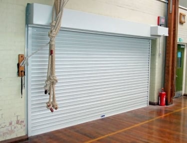fire roller shutter in white used in a school